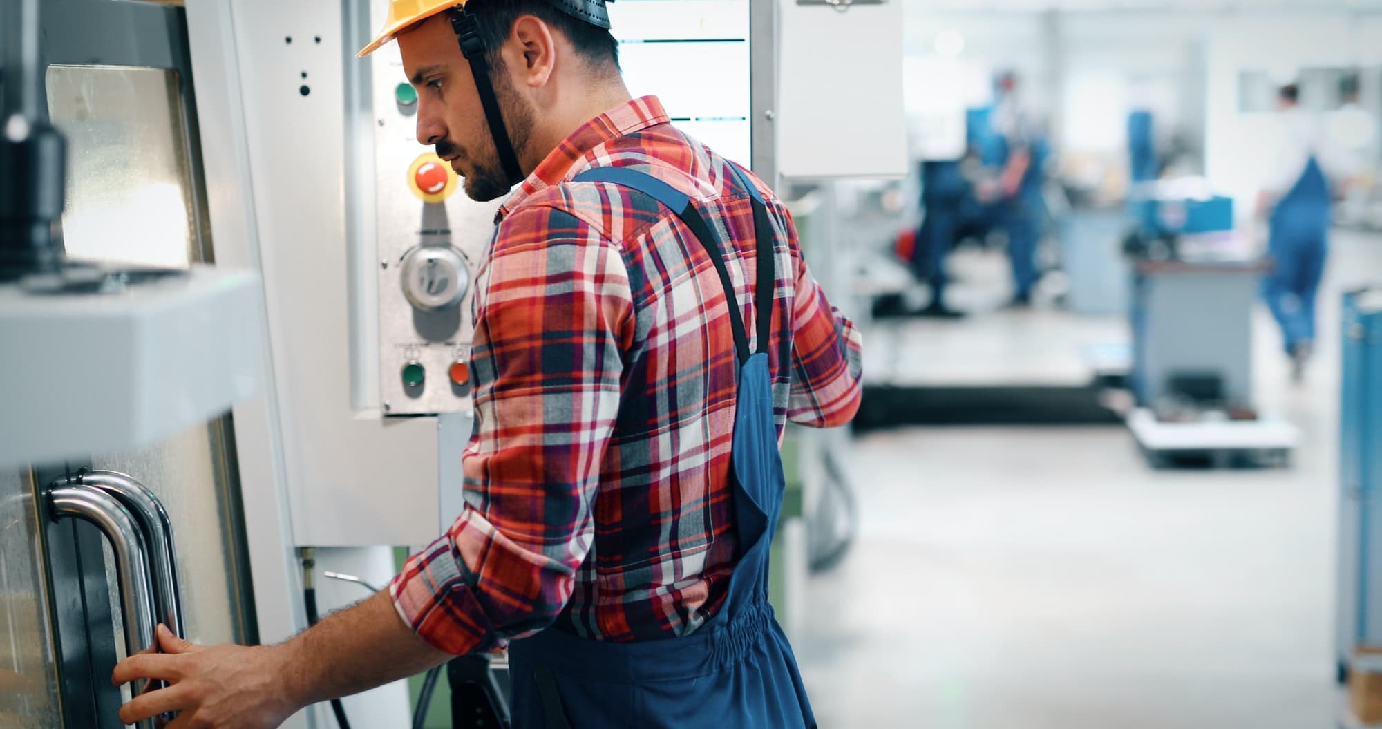 industrial factory employee working in metal manufacturing industry