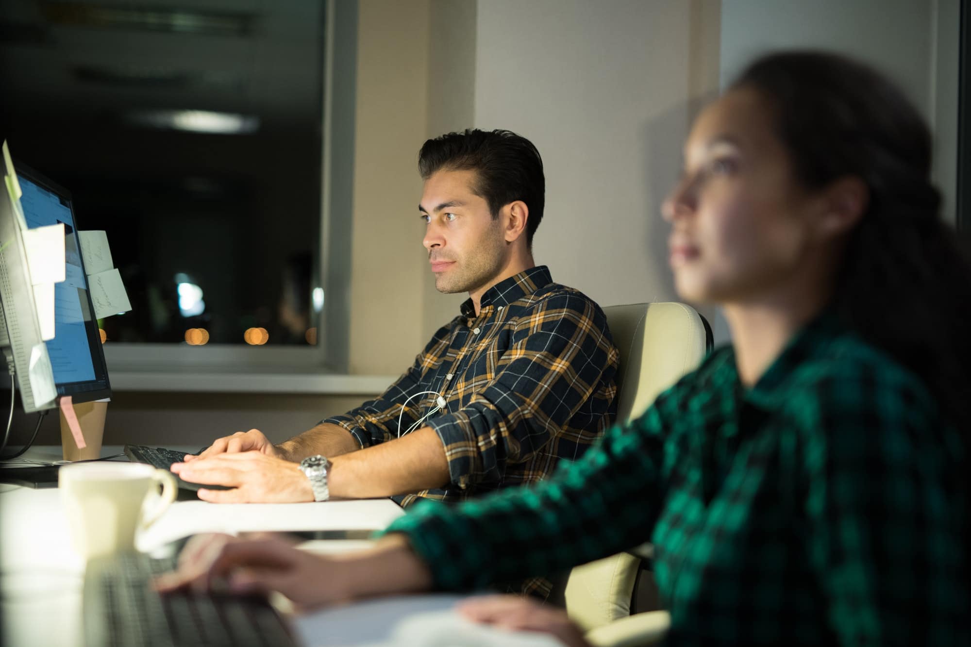 People Using Computers in Office