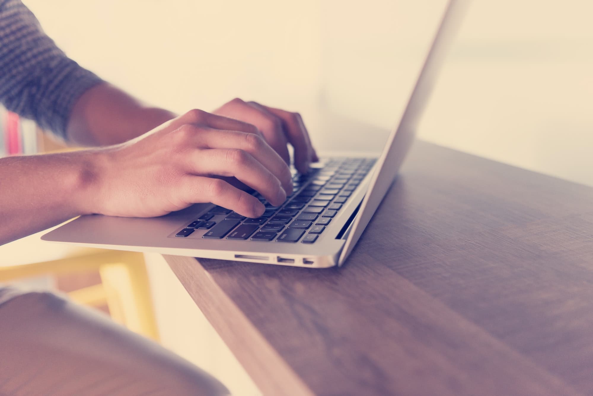 close up of male hands while working in modern office